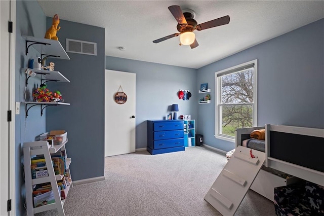 28274 W 311th St, Paola, KS 66071 - bedroom featuring carpet flooring, ceiling fan, and a textured ceiling