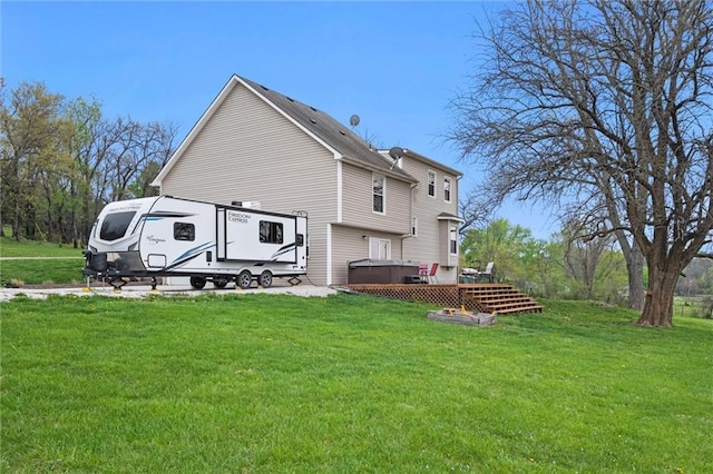 28274 W 311th St, Paola, KS 66071 - back of house featuring a yard and a wooden deck