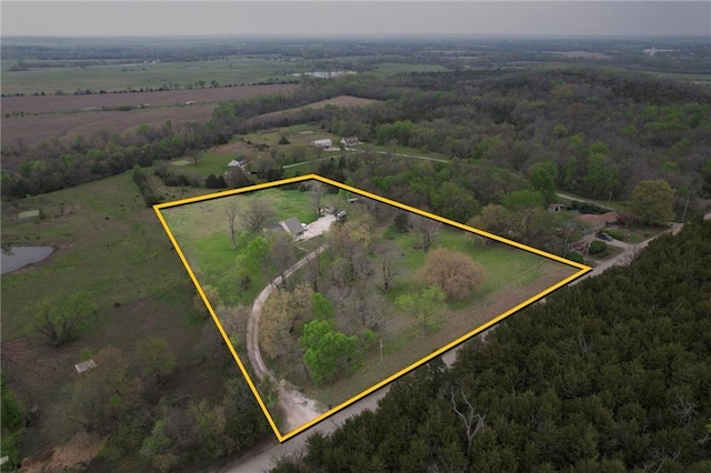 28274 W 311th St, Paola, KS 66071 - aerial view of sparsely populated area with property boundaries highlighted and a heavily wooded area
