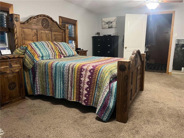 bedroom featuring a ceiling fan and carpet floors