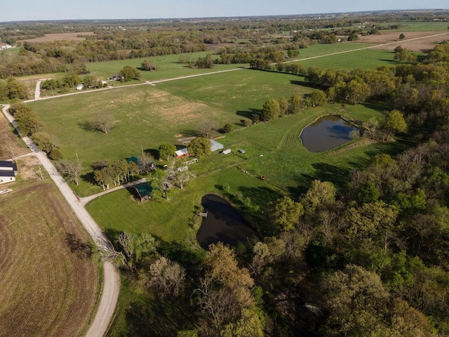 bird's eye view with a rural view and a water view
