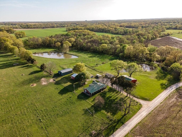 aerial view featuring a rural view and a water view