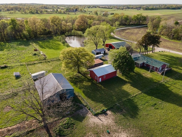 bird's eye view featuring a rural view and a water view