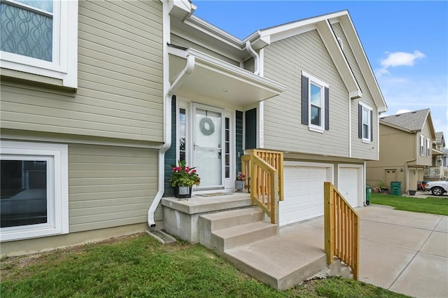 12200 E 214th Ter, Peculiar, MO 64078 - view of front facade featuring a garage and concrete driveway
