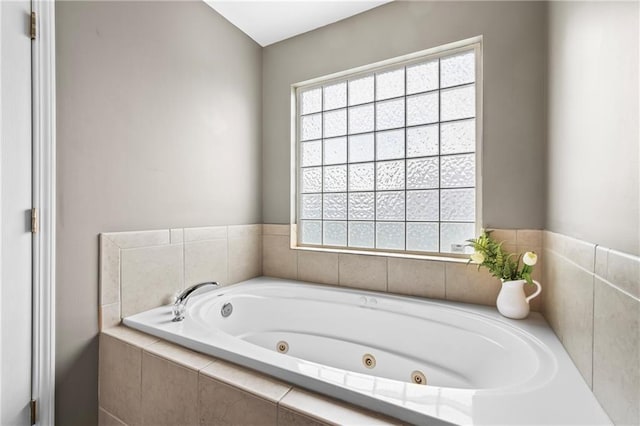 12200 E 214th Ter, Peculiar, MO 64078 - bathroom featuring plenty of natural light and a whirlpool tub