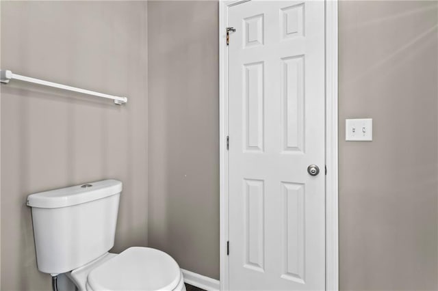 12200 E 214th Ter, Peculiar, MO 64078 - bathroom featuring toilet and baseboards