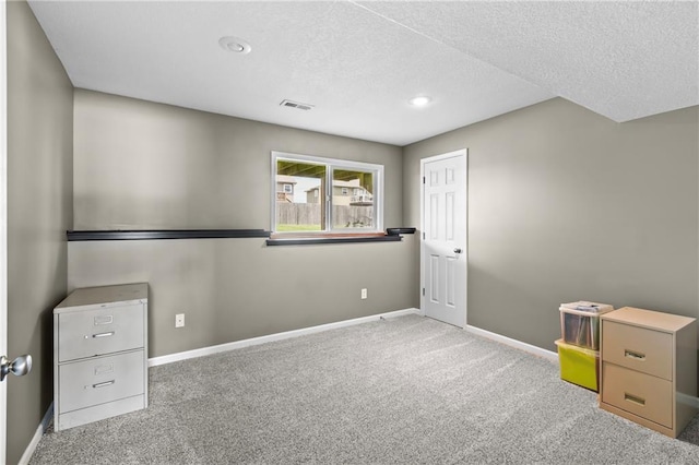 12200 E 214th Ter, Peculiar, MO 64078 - unfurnished bedroom with carpet floors, baseboards, a textured ceiling, and recessed lighting