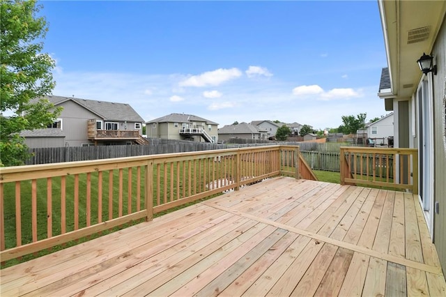 12200 E 214th Ter, Peculiar, MO 64078 - wooden terrace featuring a residential view