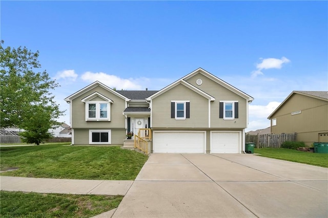 12200 E 214th Ter, Peculiar, MO 64078 - bi-level home with a garage and driveway