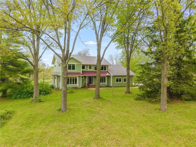 8725 Nebo Hills Rd, Liberty, MO 64068 - view of front of house featuring a front lawn and metal roof