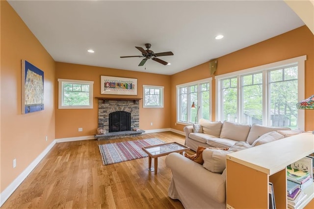 8725 Nebo Hills Rd, Liberty, MO 64068 - living room with light wood-style floors, baseboards, and plenty of natural light