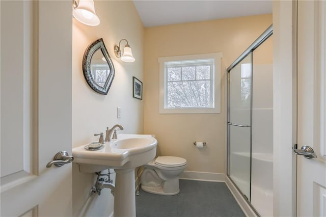8725 Nebo Hills Rd, Liberty, MO 64068 - full bath featuring an enclosed shower, baseboards, and toilet