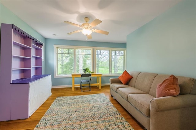 8725 Nebo Hills Rd, Liberty, MO 64068 - living room with baseboards, ceiling fan, and wood finished floors