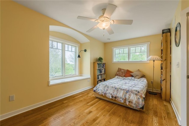 8725 Nebo Hills Rd, Liberty, MO 64068 - bedroom featuring baseboards, ceiling fan, and wood finished floors