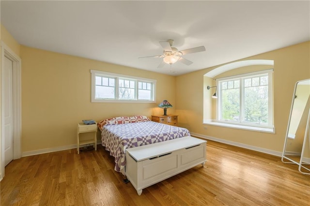 8725 Nebo Hills Rd, Liberty, MO 64068 - bedroom with baseboards, a ceiling fan, and light wood-type flooring