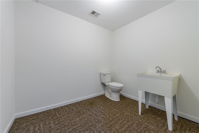 8725 Nebo Hills Rd, Liberty, MO 64068 - half bath with toilet, baseboards, and visible vents