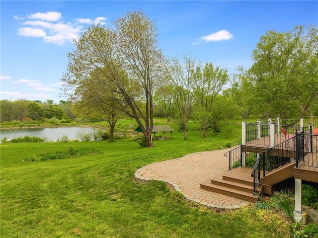 8725 Nebo Hills Rd, Liberty, MO 64068 - view of yard featuring a deck with water view