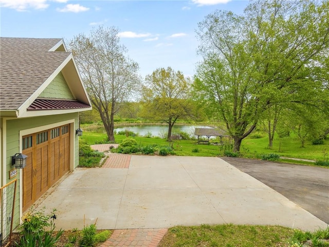 8725 Nebo Hills Rd, Liberty, MO 64068 - view of patio with a water view