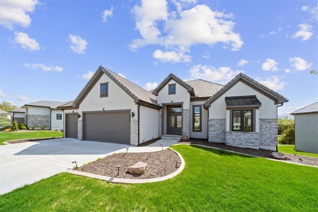6309 NW 58th Ter, Kansas City, MO 64151 - modern farmhouse featuring a front lawn, driveway, stone siding, a garage, and stucco siding