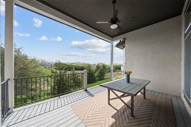 6309 NW 58th Ter, Kansas City, MO 64151 - balcony featuring a ceiling fan