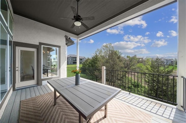6309 NW 58th Ter, Kansas City, MO 64151 - balcony featuring a ceiling fan and outdoor dining area
