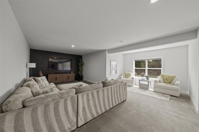 6309 NW 58th Ter, Kansas City, MO 64151 - carpeted living area featuring baseboards and recessed lighting