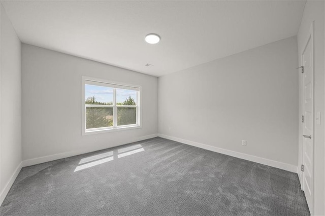 6309 NW 58th Ter, Kansas City, MO 64151 - unfurnished bedroom with baseboards and carpet floors