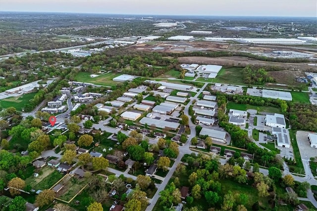 aerial view of property's location featuring nearby suburban area