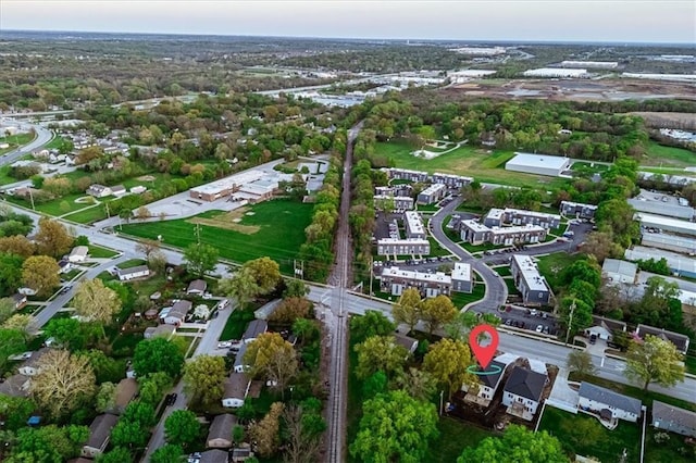 aerial view of property's location featuring nearby suburban area