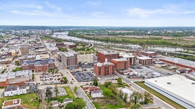 drone / aerial view with a city view and a water view