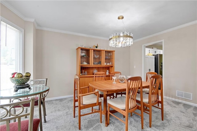 6600 W 125th Ter, Overland Park, KS 66209 - dining room with a chandelier, light colored carpet, ornamental molding, and baseboards