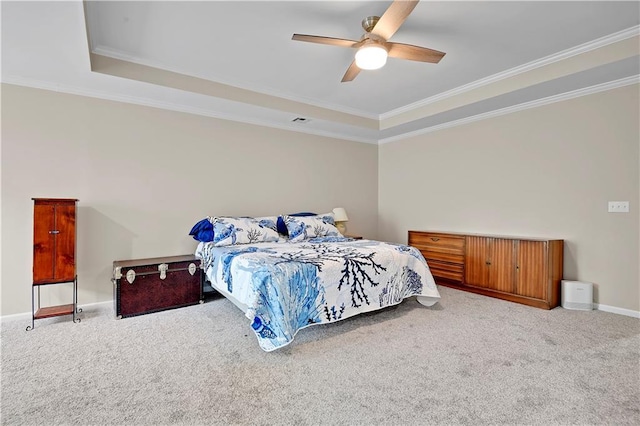 6600 W 125th Ter, Overland Park, KS 66209 - carpeted bedroom featuring a tray ceiling, ornamental molding, baseboards, and ceiling fan