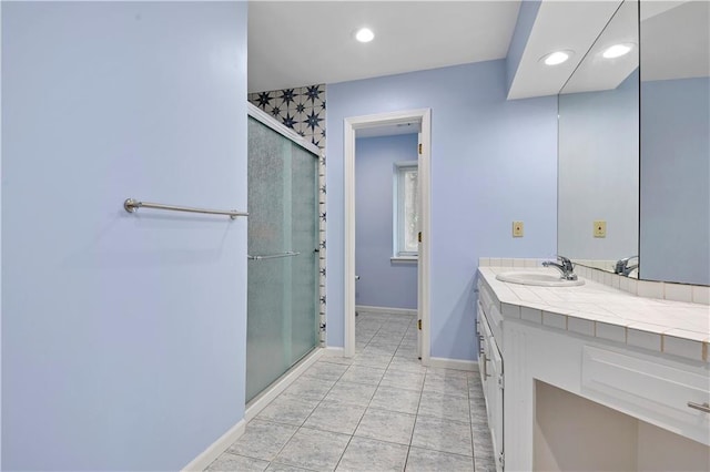 6600 W 125th Ter, Overland Park, KS 66209 - bathroom with recessed lighting, a stall shower, vanity, baseboards, and tile patterned floors