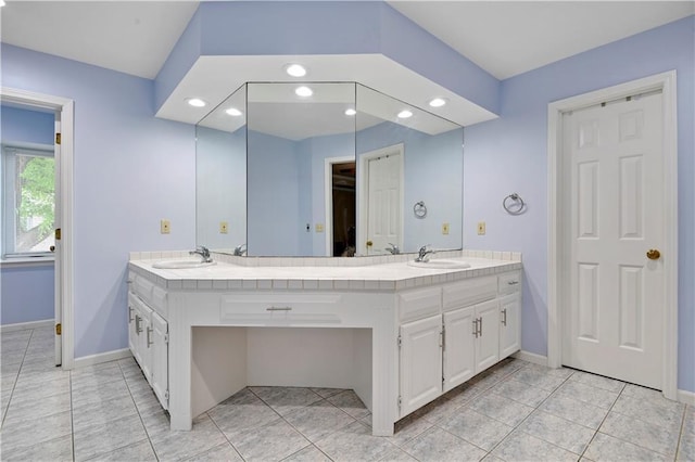 6600 W 125th Ter, Overland Park, KS 66209 - bathroom featuring recessed lighting, double vanity, baseboards, and tile patterned floors