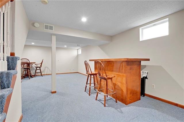 6600 W 125th Ter, Overland Park, KS 66209 - indoor dry bar with carpet floors, baseboards, a textured ceiling, and recessed lighting