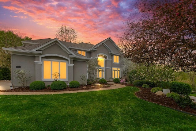 10863 S Cedar Niles Cir, Olathe, KS 66061 - traditional-style home with stucco siding and a lawn