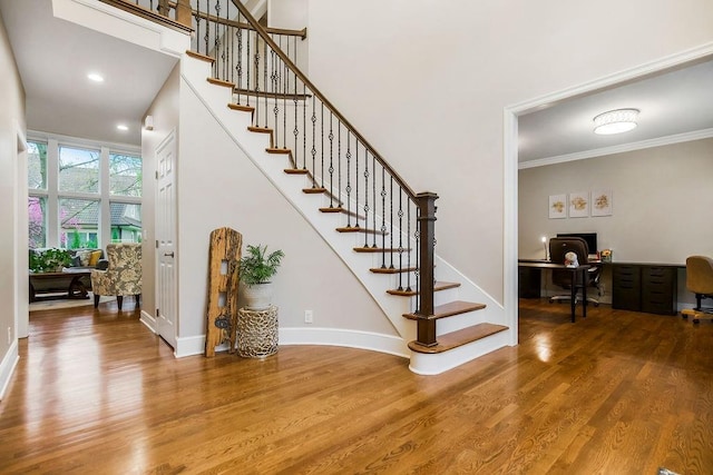 10863 S Cedar Niles Cir, Olathe, KS 66061 - stairs with wood finished floors, baseboards, and crown molding