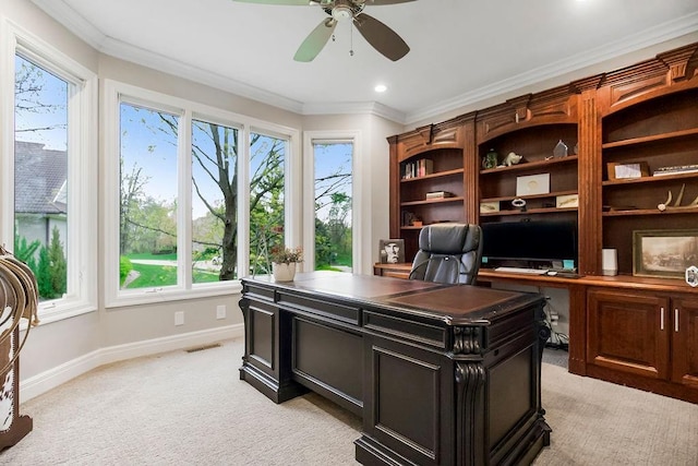 10863 S Cedar Niles Cir, Olathe, KS 66061 - home office with healthy amount of natural light, a ceiling fan, baseboards, light carpet, and ornamental molding