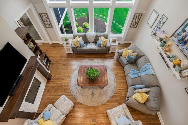 10863 S Cedar Niles Cir, Olathe, KS 66061 - living area featuring wood finished floors and baseboards