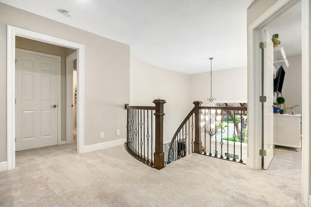10863 S Cedar Niles Cir, Olathe, KS 66061 - hallway with carpet, an upstairs landing, and baseboards