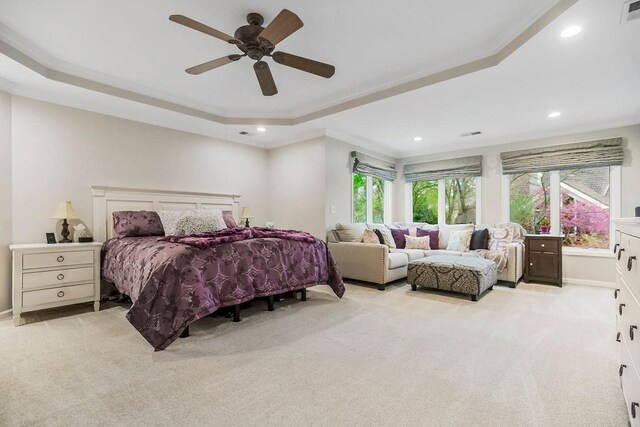 10863 S Cedar Niles Cir, Olathe, KS 66061 - bedroom featuring light colored carpet, a tray ceiling, crown molding, recessed lighting, and ceiling fan