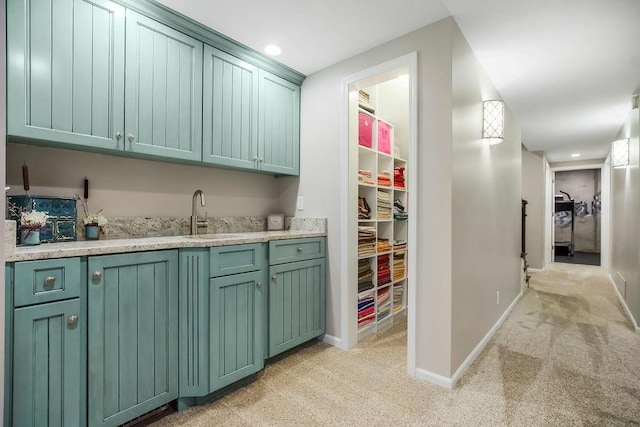 10863 S Cedar Niles Cir, Olathe, KS 66061 - bar with light carpet, a sink, baseboards, and recessed lighting