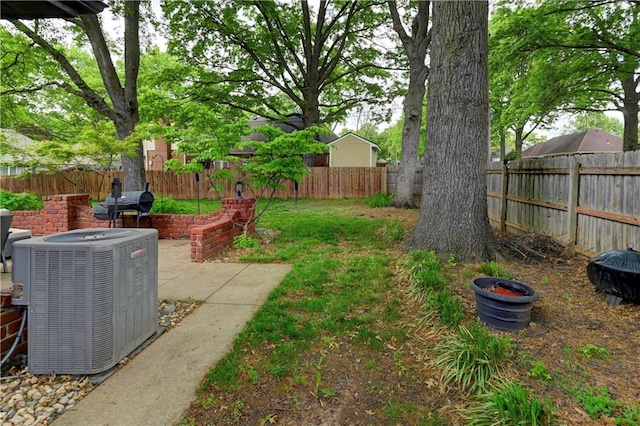 1400 SW 8th Ter, Lees Summit, MO 64081 - fenced backyard with central air condition unit and a patio area