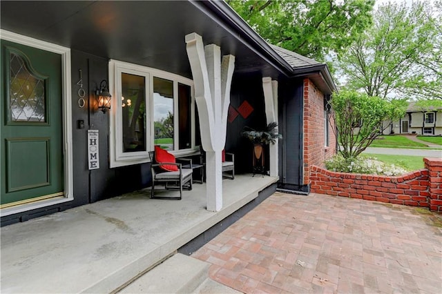 1400 SW 8th Ter, Lees Summit, MO 64081 - property entrance featuring brick siding and a porch