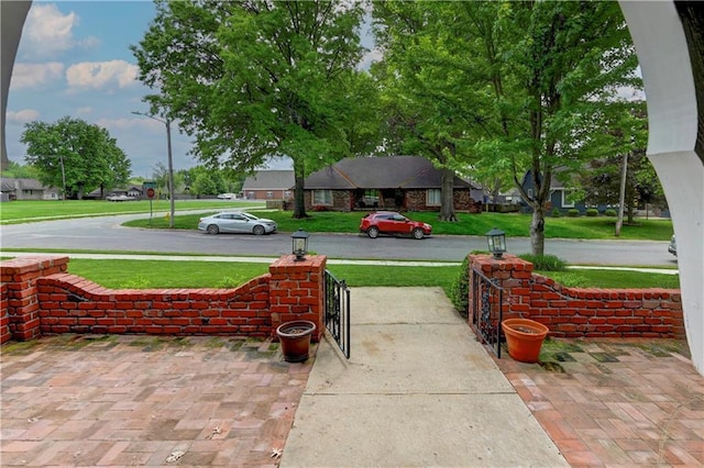 1400 SW 8th Ter, Lees Summit, MO 64081 - view of grassy yard with covered porch