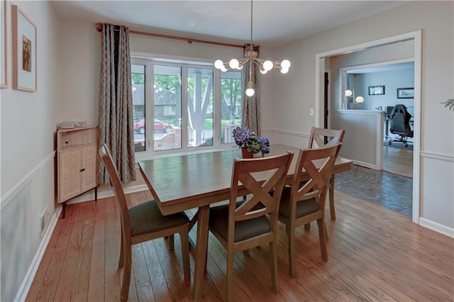 1400 SW 8th Ter, Lees Summit, MO 64081 - dining area featuring light wood-type flooring, a chandelier, and an office area