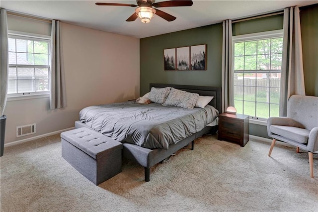 1400 SW 8th Ter, Lees Summit, MO 64081 - carpeted bedroom featuring baseboards and ceiling fan