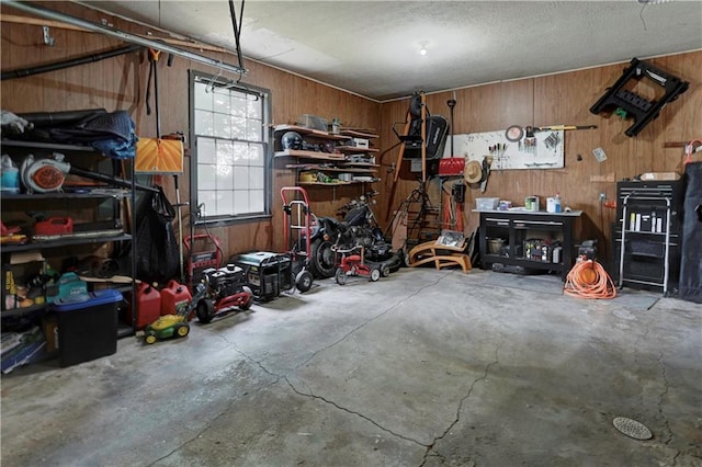 1400 SW 8th Ter, Lees Summit, MO 64081 - garage featuring wooden walls and a workshop area