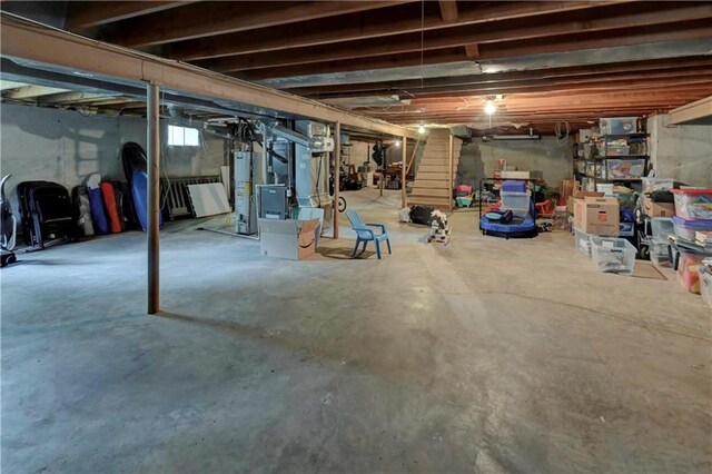 1400 SW 8th Ter, Lees Summit, MO 64081 - unfinished below grade area with stairs, gas water heater, and heating unit
