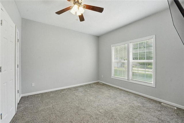 3945 SW Batten Dr, Lees Summit, MO 64082 - carpeted spare room with ceiling fan and baseboards